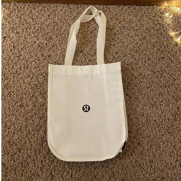 SOLD***Lululemon- Small Reusable Tote Bag Snap Button Close White 9" x 12" - Picture 2 of 5